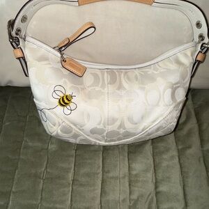 Stylish White and Tan Coach Women's Bag